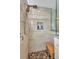 This walk-in shower features a rainfall shower head, bench, and tile surround at 526 Allen St, Punta Gorda, FL 33950