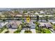 Beautiful waterfront home featuring lush landscaping, a private dock, and scenic canal views, ideal for boating enthusiasts at 80 Hibiscus Dr, Punta Gorda, FL 33950