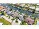 Aerial view showcasing waterfront homes, canals, boat docks, and beautiful landscaping at 80 Hibiscus Dr, Punta Gorda, FL 33950