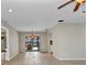 Spacious dining room with sliding glass doors leading to a pool area and tile flooring throughout at 80 Hibiscus Dr, Punta Gorda, FL 33950