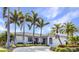 Charming single-story home boasting a well-manicured lawn and lush palm trees, perfect for a serene coastal living at 80 Hibiscus Dr, Punta Gorda, FL 33950