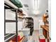 Well-organized garage with shelving units, utility sink, and ample storage space at 80 Hibiscus Dr, Punta Gorda, FL 33950