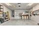 Spacious garage area with storage shelves and work area at 80 Hibiscus Dr, Punta Gorda, FL 33950
