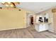 Open-concept living room and kitchen area with tile flooring and a vaulted ceiling at 80 Hibiscus Dr, Punta Gorda, FL 33950