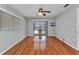 Bright main bedroom with hardwood flooring and slider to patio at 80 Hibiscus Dr, Punta Gorda, FL 33950