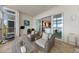 Inviting covered balcony with comfortable seating, perfect for relaxing and enjoying the serene view at 95 N Marion Ct # 135, Punta Gorda, FL 33950
