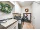 Laundry room featuring a washer and dryer, tile floors, and a sink at 95 N Marion Ct # 135, Punta Gorda, FL 33950