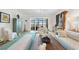 Bright living room provides access to a balcony, elegant décor, and an open-concept design at 95 N Marion Ct # 135, Punta Gorda, FL 33950