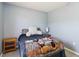 Comfortable bedroom features two side tables, a bed and neutral wall color at 105 Biscayne Dr, Port Charlotte, FL 33953