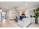 Comfortable living room with plush seating, stylish decor, and a large area rug at 1132 Moss Cove Ct, Port Charlotte, FL 33953