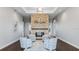 Inviting lobby area with stone fireplace, seating, and modern decor at 1132 Moss Cove Ct, Port Charlotte, FL 33953