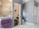 Modern bathroom features a glass shower with a heron design and a second walk-in shower at 1313 Wise Dr, North Port, FL 34286