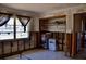 Unfinished bedroom with window, closet, and exposed studs offers remodel potential at 148 Peckham St Se, Port Charlotte, FL 33952