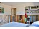 View of bedroom with closet and doorway amid exposed studs, offering reno potential at 148 Peckham St Se, Port Charlotte, FL 33952