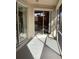 Screened-in patio featuring sliding glass doors at 1488 Squaw Ln, North Port, FL 34286