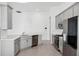 Modern kitchen featuring stainless steel appliances, stylish countertops, and ample cabinet space at 16029 Mulrion Blvd, Punta Gorda, FL 33982