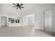 Tile flooring and bright natural light fill this open concept kitchen and living area at 16029 Mulrion Blvd, Punta Gorda, FL 33982