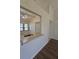 Living Room with bar pass through to the kitchen at 19583 Kapok Ct, Port Charlotte, FL 33952