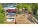 Aerial view of a cozy home with a spacious yard and a detached garage, great for outdoor living at 2002 Central Ave, Sarasota, FL 34234