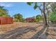 Exterior of a charming house with large yard and a detached garage in a tranquil setting at 2002 Central Ave, Sarasota, FL 34234