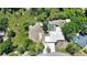 Spacious lot with a private swimming pool, lush green surroundings, and a well-maintained single-Gathering home at 22435 Fortune Ave, Port Charlotte, FL 33954