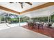 Screened-in pool area with a seating area at 22435 Fortune Ave, Port Charlotte, FL 33954