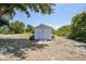 White storage shed exterior, providing extra storage and organizational opportunities at 22435 Fortune Ave, Port Charlotte, FL 33954