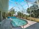 Enjoy this spacious, screened-in pool with a lounging area and sunny sky views at 2288 Prague Ln, Punta Gorda, FL 33983