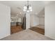 Well-equipped kitchen features stainless steel appliances and seamlessly connects to the adjacent living spaces at 23470 Burlingame Ave, Punta Gorda, FL 33980