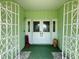 Inviting front entryway with double doors and decorative ironwork welcomes you home at 2500 Aquilos Ct, Port Charlotte, FL 33952