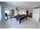 Fun game room with a classic pool table is perfect for entertaining guests at 2500 Aquilos Ct, Port Charlotte, FL 33952