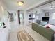 Bright and open living room with marble floors offers ample space for relaxation and entertainment at 2500 Aquilos Ct, Port Charlotte, FL 33952