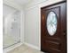 Foyer featuring a paneled door and neutral finishes at 31037 Prairie Creek Dr, Punta Gorda, FL 33982