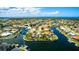 Expansive aerial shot of a waterfront community with access to the Gulf, showcasing a lifestyle of boating, fishing, and leisure at 3520 Caya Largo Ct, Punta Gorda, FL 33950