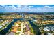 Scenic aerial view showcasing waterfront homes nestled along winding canals with backyard boat docks at 3520 Caya Largo Ct, Punta Gorda, FL 33950