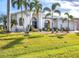Charming single-story home featuring a new metal roof and lush landscaping in a tropical climate at 3520 Caya Largo Ct, Punta Gorda, FL 33950