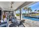 Waterfront outdoor patio with a seating area and water views at 3520 Caya Largo Ct, Punta Gorda, FL 33950