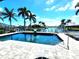 Enjoy swimming in your own private pool with calming views of the canal and clear blue skies at 3520 Caya Largo Ct, Punta Gorda, FL 33950