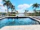 A private pool offers stunning views of the peaceful canal and lush surroundings, perfect for relaxing and entertaining at 3520 Caya Largo Ct, Punta Gorda, FL 33950