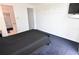 This bedroom has a ceiling fan, natural light, and wall mounted TV at 3787 Whippoorwill Ct, Punta Gorda, FL 33950
