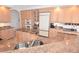 Spacious kitchen featuring granite countertops, an island, and ample cabinetry at 3787 Whippoorwill Ct, Punta Gorda, FL 33950