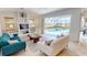 Bright living room with a view of the pool and patio area at 3787 Whippoorwill Ct, Punta Gorda, FL 33950