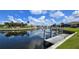 Beautiful canal view with multiple boat docks and waterfront homes in the distance at 3787 Whippoorwill Ct, Punta Gorda, FL 33950