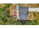 Top down aerial view of home featuring patio and driveway at 4129 Palisades Ave, North Port, FL 34287