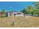 Backyard featuring a shed, and defined mulch area in the back at 4129 Palisades Ave, North Port, FL 34287