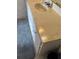 Bathroom vanity with a cream colored countertop, white cabinets, and a mirror above the sink at 618 Bird Bay S Dr # 109, Venice, FL 34285