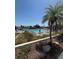 Community pool area featuring a swimming pool, lounge chairs, and lush landscaping, offering a relaxing outdoor space at 618 Bird Bay S Dr # 109, Venice, FL 34285