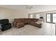 Cozy living area featuring tile floors, comfortable seating and french doors at 6309 Pontiac Ln, North Port, FL 34287