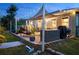 Outdoor patio with string lights, outdoor furniture, and a backyard space perfect for entertaining and outdoor relaxation at 7122 Turner St, Englewood, FL 34224
