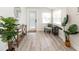 Bright entryway with neutral paint and flooring, providing a modern and welcoming ambiance at 7413 S Elliott St, Tampa, FL 33616